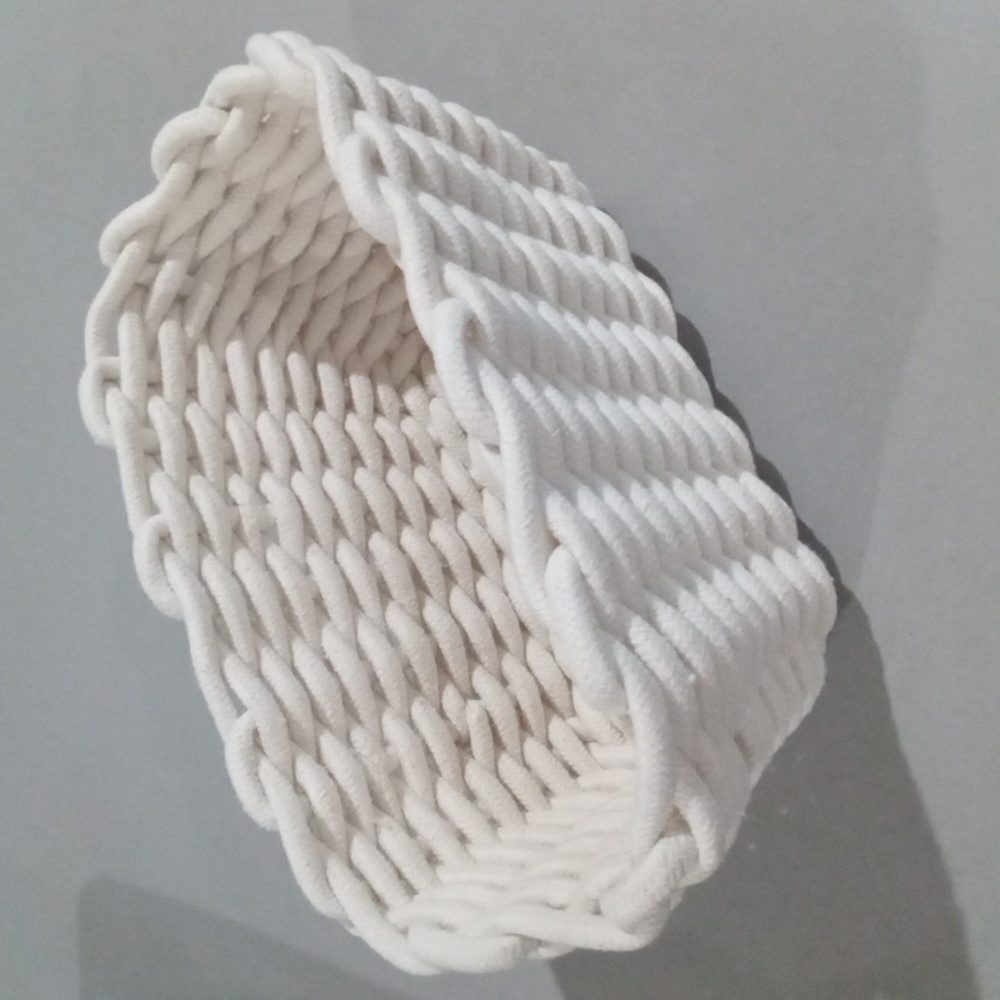 White heavy cord woven basket